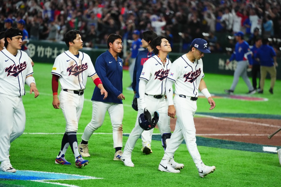 延長戦の末敗れた韓国代表ナイン【写真：小林靖】